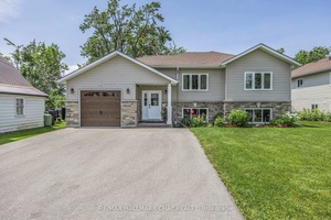 Nestled in the heart of Brechin, this custom built home, crafted with exceptional attention to detail in 2018, offers an inviting atmosphere with spacious, sunlit rooms.