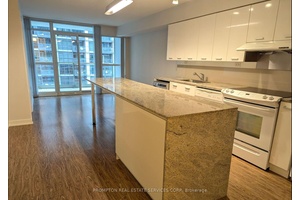 South Facing Luxury Condo, Approximately 703 Sqft W Two Full Bathrooms.