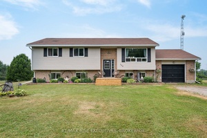 This adorable bungalow is the perfect family home, it's freshly painted, filled with natural light, and offering wide open views of the fields beyond the backyard.