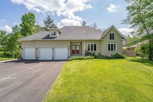Welcome to this upscale and spacious bungalow offering approx.