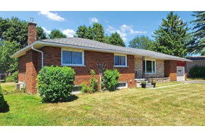 Charming 3 1 Bedroom Bungalow with a rental suite on Oversized Lot in Prime Stroud Location.