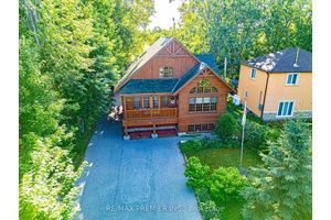 Full time living or your dream retreat an extraordinary amp ; modern Confederation Log amp ; Timber Frame home offering warmth, craftsmanship, and timeless beauty, across the street from the ...