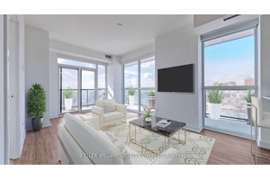 Experience upscale city living at its finest in this stunning executive 2 bedroom den corner suite at the sought after Empire Midtown.