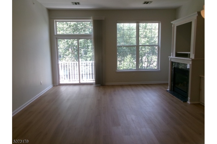 Living Room w/ Frpl