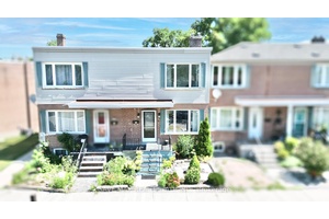 Beautifully Updated 2 1 Bedroom Freehold Townhouse in Prime Transit Accessible Location !