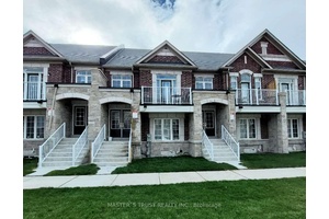 2 Bedrooms 1 Washroom on Ground amp ; Lower Level in Sun Filled Townhouse Located In Prestigious Richmond Green Community.