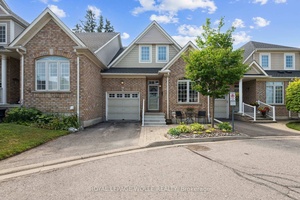 Spacious 4 Bedroom Townhouse with Main Floor Primary Suite Ideal for Retirees or Investors.