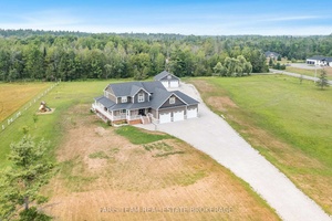 Top 5 Reasons You Will Love This Home 1 Immaculate executive home set on a sprawling lot, offering space, privacy, and upscale living 2 Prime location for commuters with easy ...