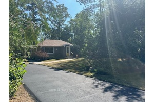 Absolutely pristine 4 season, 2 bedroom, 2 bathroom Bungalow located in sought after Stinsons Bay Community.