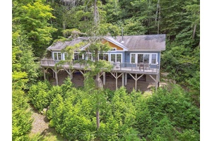 Set on 2 acres of land with over 300 feet of shoreline, this property is very, very private.