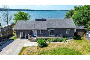 ESCAPE TO ORR LAKE FOUR SEASON FUN WITH 110 FT OF SHORELINE, A DOCK amp ; MULTIPLE OUTBUILDINGS !