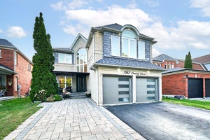 This Home Has It All ! Welcome To 3082 Country Lane, A Magnificent 4 1 Bedroom, 5 Bathroom Home With A Finished Walk Out Backing Onto The Ravine.