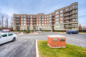 Stunning End Unit with Expansive Windows and Scenic Views !