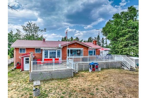 If you are looking for a year round Balsam Lake property with superb swimming waterfront and plenty of capacity for family and guests, this is the place for you !