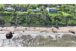 Enjoy panoramic views and unforgettable sunsets from this charming soundfront retreat in Cutchogue.