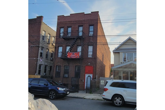 View of front facade with brick siding