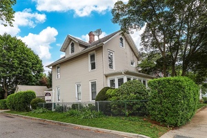 Two Family Home with Bonus Lot and Prime Location !