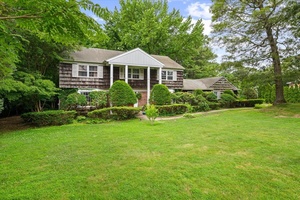 Spacious 6 Bedroom Colonial located in a prime Dix Hills setting within the Half Hollow Hills School District.