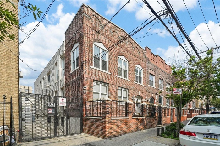 View of property with a fenced front yard