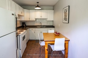 This charming 690 sq ft rural bungalow offers 2 bedrooms and 1 bath, immersed in natural light from large windows and nestled on 33 aces of picturesque forest.