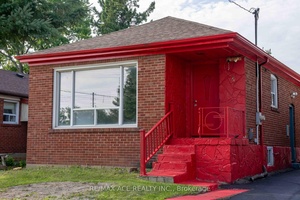 This charming family friendly home features a modern, open concept design with two convenient entrances, offering both functionality and style.