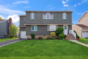 Welcome Home To This Spacious Expanded Ranch In Massapequa Park.