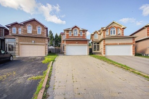 Bright amp ; Spacious 4 Bedroom Detached Home With Double Garage And Legal Separate Entrance To Basement.