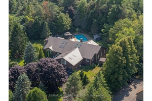 Welcome to 64 Woodbridge Circle, an exquisite estate home nestled within the prestigious Oakridge Golf Course community.