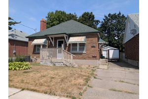 Well located brick bungalow, walk to shopping, Potential separate side entrance to basmn't.