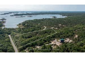 Nestled in the heart of nature, this stunning 10 acre property offers unparalleled views and serene living, just minutes from Dillon Cove.