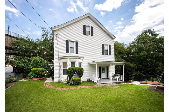 View of front of property with a porch