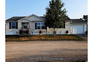 Welcome to 7 Forest Trail in Sandusk Creek Properties, where comfort and community come together.