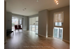 Bright and Spacious Southwest Corner Unit in Prime Downtown Location !