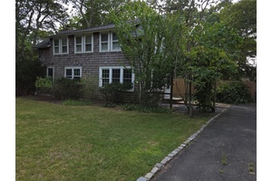 Westhampton Beach Village location offers Beach Access from this legal two family home, 3 bedroom 2 bath downstairs with fireplace and washer dryer.