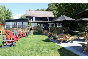 Nestled in the picturesque town of Minden Hills, Ontario, The Rockcliffe Hotel is a charming retreat that combines rustic elegance with modern comfort.