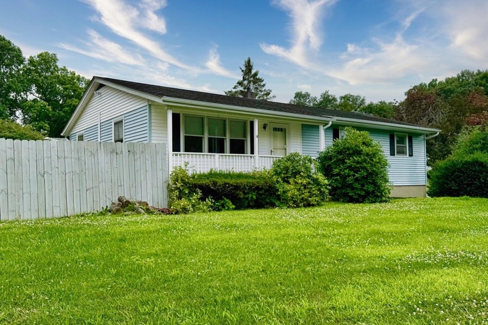 Single story home with covered porch