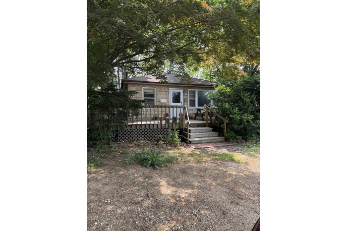 View of front facade featuring a deck