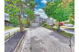 Welcome to 100 Greenbelt a thoughtfully maintained home nestled in the prestigious North Richvale community of Richmond Hill.