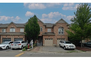 This charming family townhome boasts 3 bedrooms and 3.