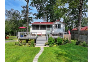 Tucked along the banks of the Wallkill River, 315 Forest Glen Extension is a rare gem.