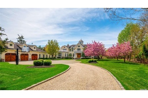 Escape to a serene 4. 74 acre waterfront haven in Center Moriches.