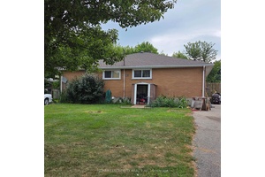 This solid brick 4 plex needs updates, renos and refurbishment.