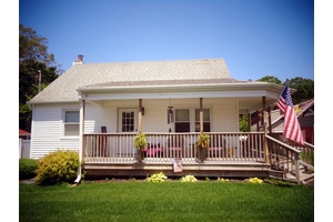 Welcome to your meticulously remodeled Cape Cod gem !