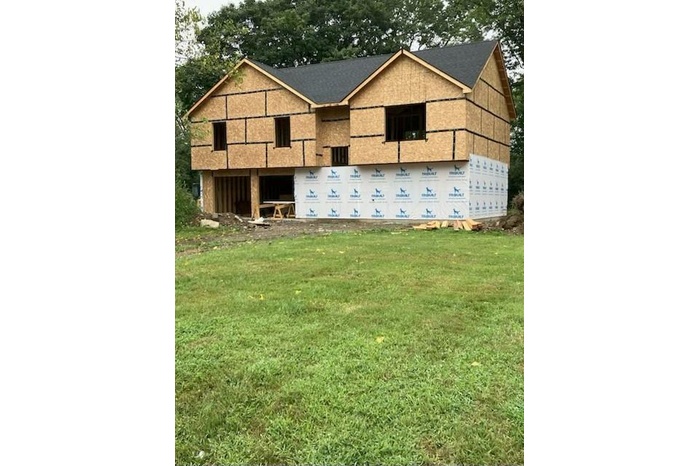 Front of house  with shingled roof