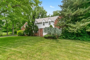 Stately BRICK C H Colonial Blending Timeless Charm With Modern Comfort amp ; Spacious Interiors.