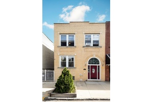 825 East 230th Street is a 22 ft wide house resting on a peaceful block, a couple blocks from the 2 train.