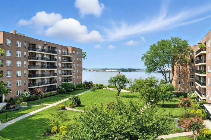 Surrounding community with a water view