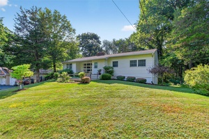 Whether you're looking to settle down or spread out, this home blends retro character with modern livability.