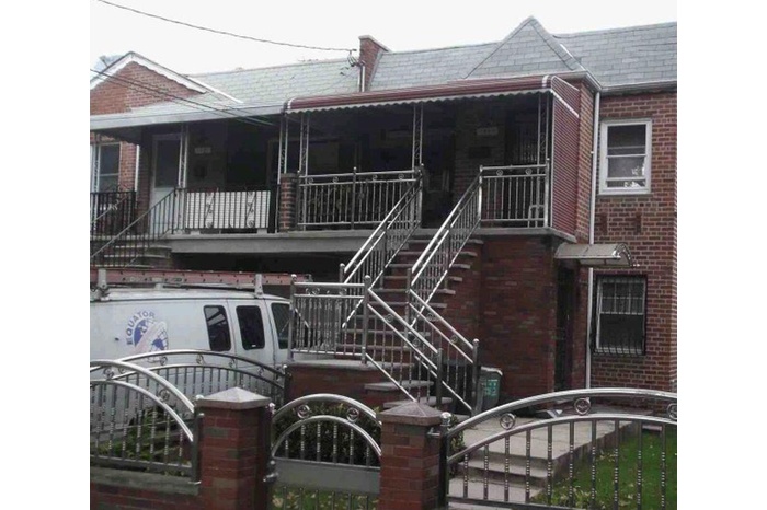 View of building exterior with stairway