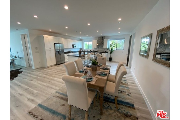 Open floor Dining area leads t
